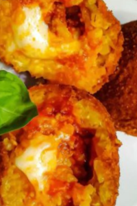 Arancini di Riso #riceballs #meatandpeas #arancini #aranciniballs #arancinisiciliani #arancinidiriso #italianfood #cibo #ciboitaliano #italiancatering #italiancooking #catering #dandgcatering #cucinaitaliana #instafood #foodporn #foodlover #homemade #homemadefood #growingupitalian #letseat Here’s a detailed step-by-step recipe guide for Arancini di Riso that follows your specifications: Arancini di Riso: Italian Rice Balls