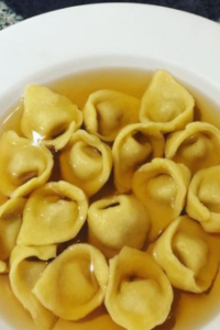 Tortellini in Brodo⠀⠀⠀⠀⠀⠀⠀⠀⠀ #tortelliniinbrodo #tortellini #saffronbroth #pasta #ricottatortellini #christmasrecipes#tortellinibolognesi #tortellinibologna #tortellini #tortelliniinbrodo #Naturaliabv #italiaansekerst #italiaanskerstmenu Tortellini in Brodo: A Comforting Italian Classic