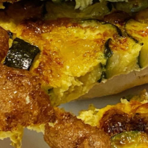 Frittata di Zucchine e Formaggio  #paninidiandreabultrini . #panini #paniniitaliani #sandwich #italiansandwich #paninoconlafrittata #frittata #frittatona #frittatadicipolle #frittataconlecipolle #frittatadizucchine #frittatacipollezucchine #frittatazucchineecipolle #italianomelette #omelette #frittataalforno #cucinacasereccia #cucinapovera #piattidaosteria #cucinadaosteria #cucinaromana #cucinaitaliana #andreabultrinitrastevere #andreabultriniricette #cucinaromanadiandreabultrini #cucinatradizionale #cucinatrasteverina #piattounico #italianfood #iloveitalianfood Frittata di Zucchine e Formaggio: A Delicious Italian Classic