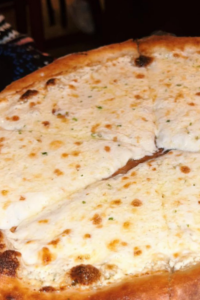 Pizza Bianca con Robiola#iriseatz #cipollini #americanamanhasset #eatinglongisland #longislandeats #lieats #trufflepizza #whitepizza #robiola #robiolapizza Pizza Bianca con Robiola: A Step-by-Step Recipe Guide