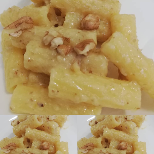 Pasta al Sugo di Noci #rigatoni#sugodinoci#pastaalsugodinoci##pastalover#pasta#italianpasta#pastaitaliana#homemade#unmaritochecucina#foodlover#yummi#confortfood#épiaciutoanchealei#healthyfood#gnam#cena#piattoricco#piattounico#italianfood#cucinaitaliana#cucinatradizionale#piattitipici#cucinacasalinga#pastasciutta#mangiarebene#mangiaresano#lhofattoio #pasta #pastarecipe #pastas #pesto #pestogenovese #pansotti #pastaalpesto #pansoti #sugodinoci #pestopasta #foodporn #foodlovers #foodstyling #foodphotography #tastyfood #tasty #taste #italiantaste #genova #liguriagram #genovese #genovamorethanthis #pastafresca #pastatime #lunchtime #pastaalsugodinoci #pansotialsugodinoci Pasta al Sugo di Noci: A Nutty Italian Delight